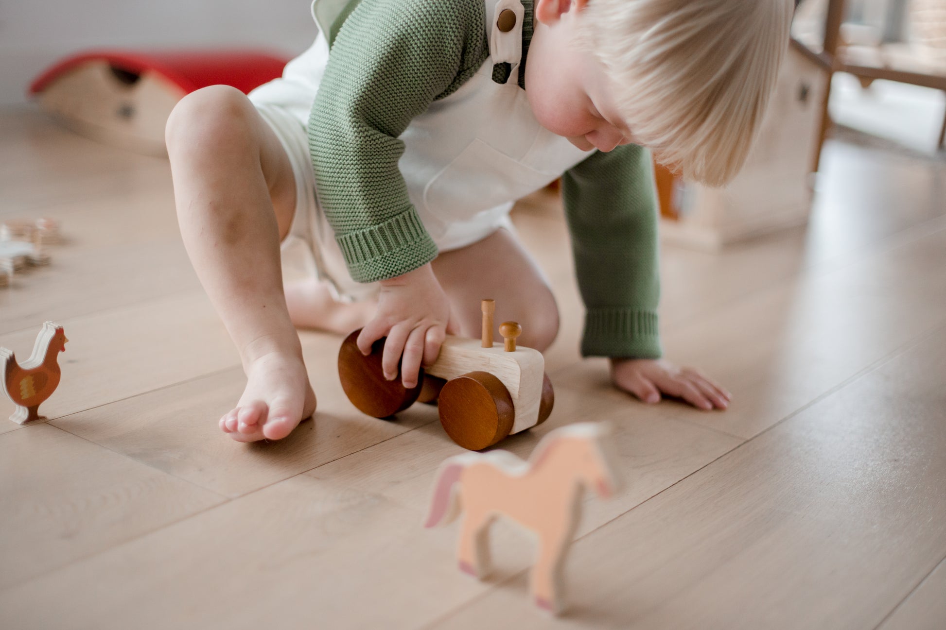 Little hands explore the Farm Animals & Tractor Set, creating fun farmyard adventures in imaginative play.