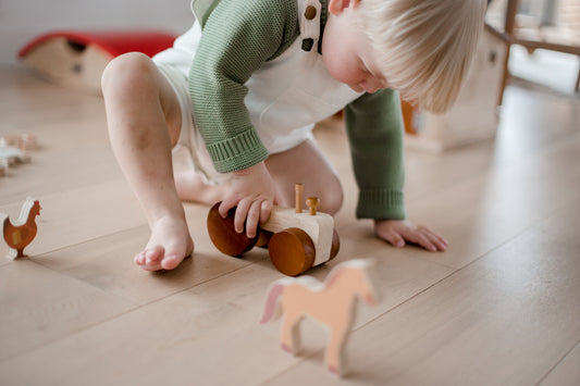 Little hands explore the Farm Animals & Tractor Set, creating fun farmyard adventures in imaginative play.